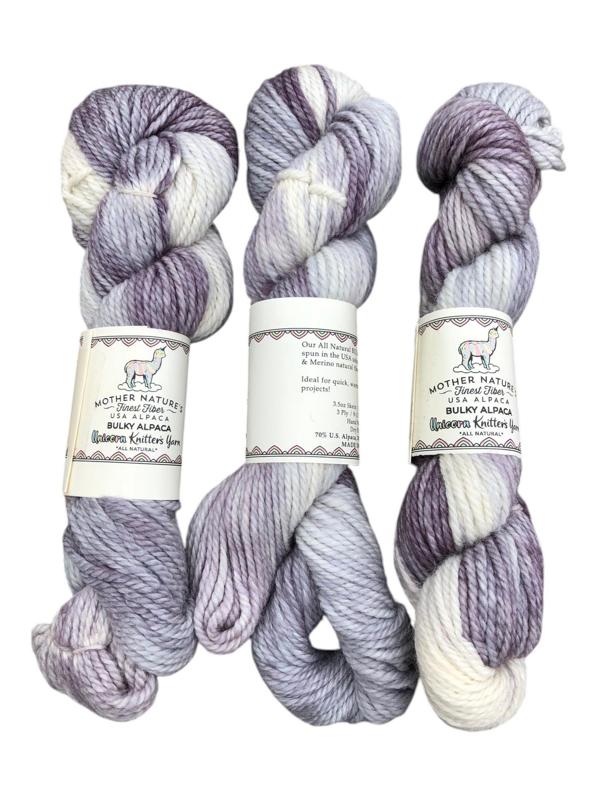 Oak Crest Alpacas and More chunky 3-ply yarn skeins in variegated purple and white alpaca and merino wool blend