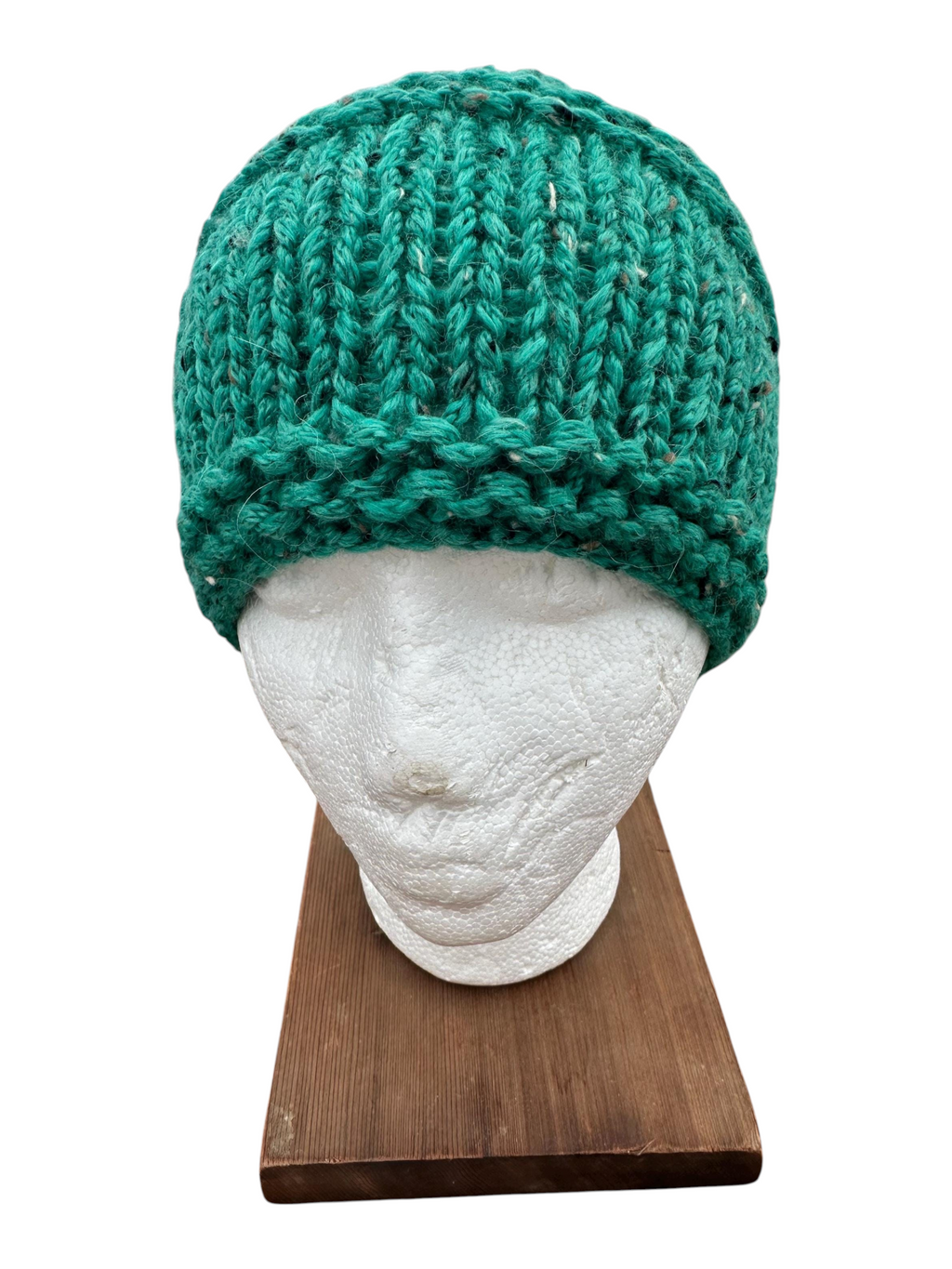 Oak Crest Alpacas and More handmade chunky knit hat in emerald green alpaca wool blend on a mannequin head