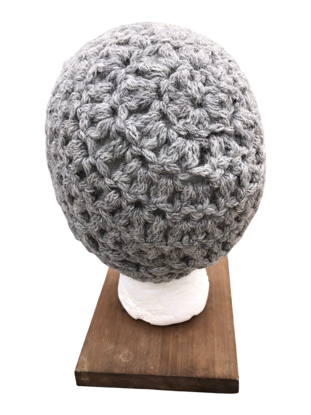 Oak Crest Alpacas and More chunky grey hand-crocheted alpaca wool hat on a display stand