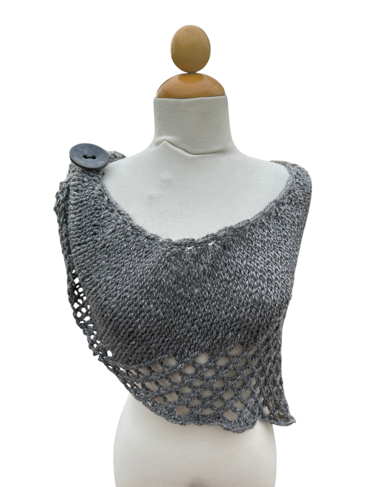 Oak Crest Alpacas and More grey hand knit 100% alpaca shawl with a decorative button cuff on a mannequin