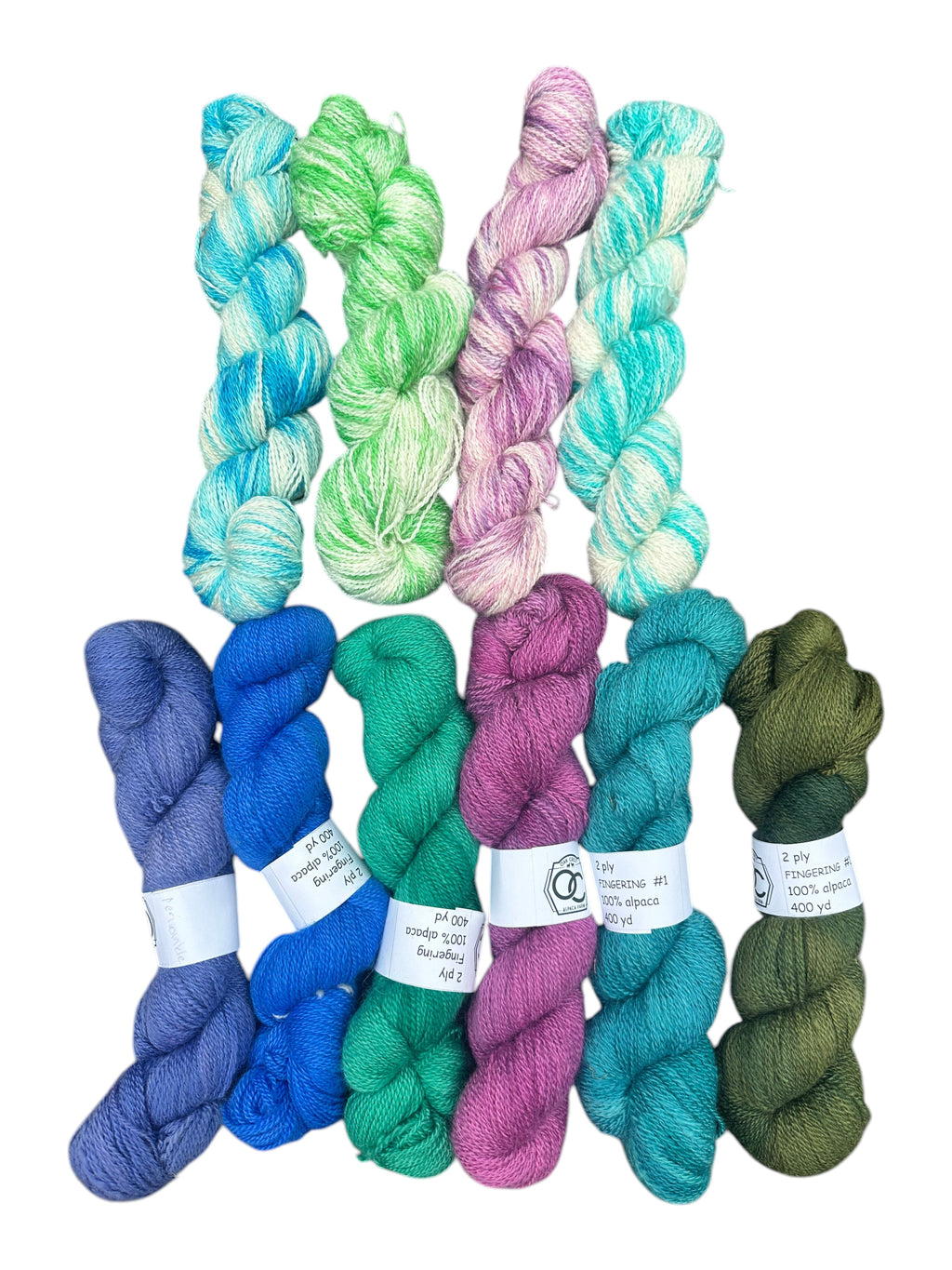 Oak Crest Alpacas and More hand-dyed 100% American alpaca fingering weight yarn skeins in vibrant assorted colors.