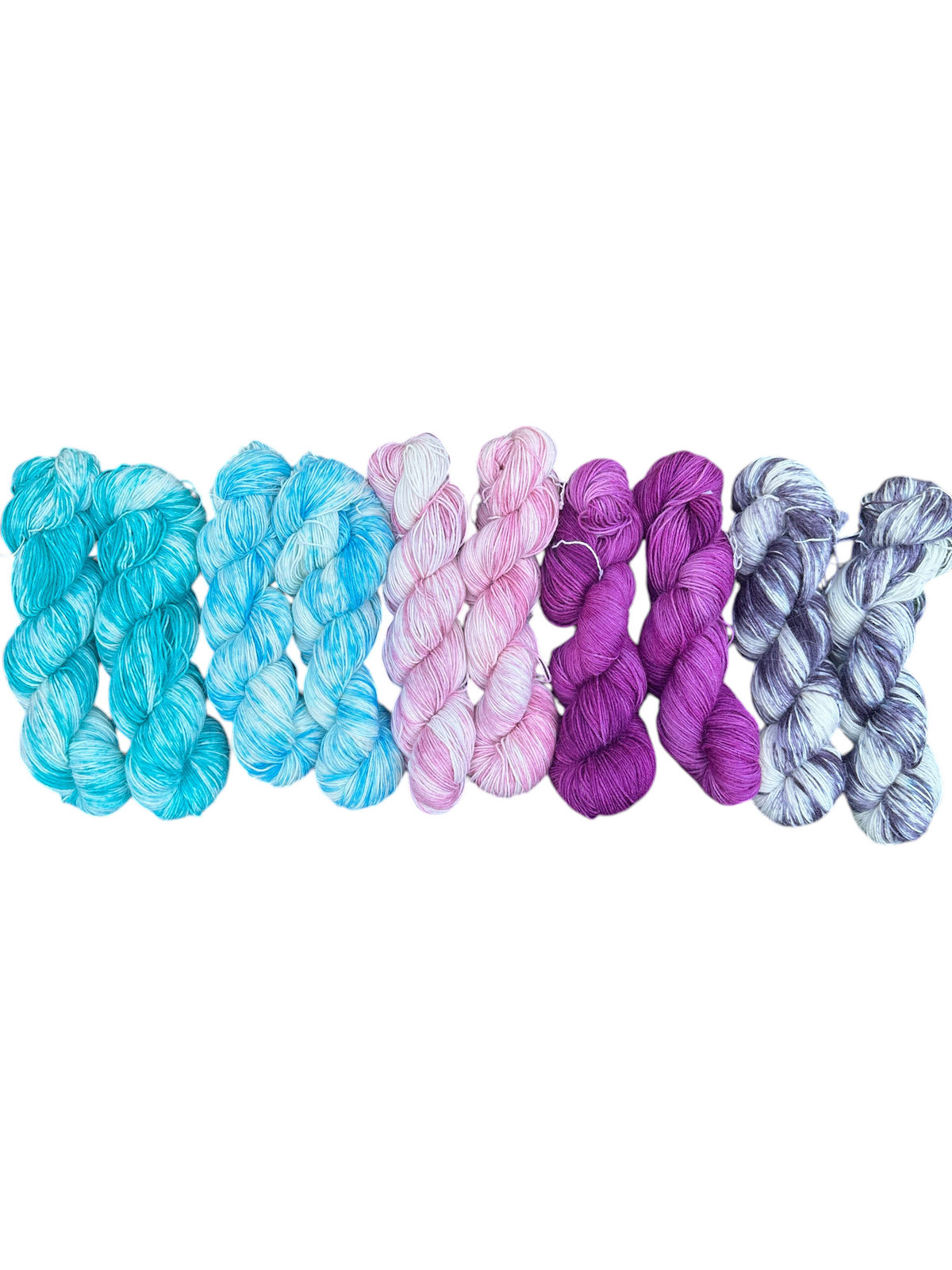 Oak Crest Alpacas and More hand-dyed alpaca nylon fingering weight sock yarn skeins in various vibrant colors.