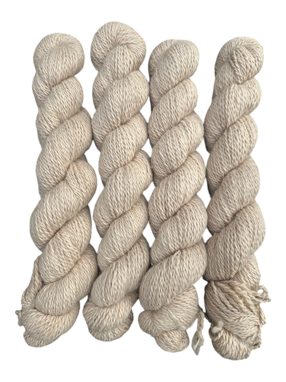 Oak Crest Alpacas and More natural light fawn 2-ply alpaca yarn skeins, soft dehaired fiber for knitting and crochet.