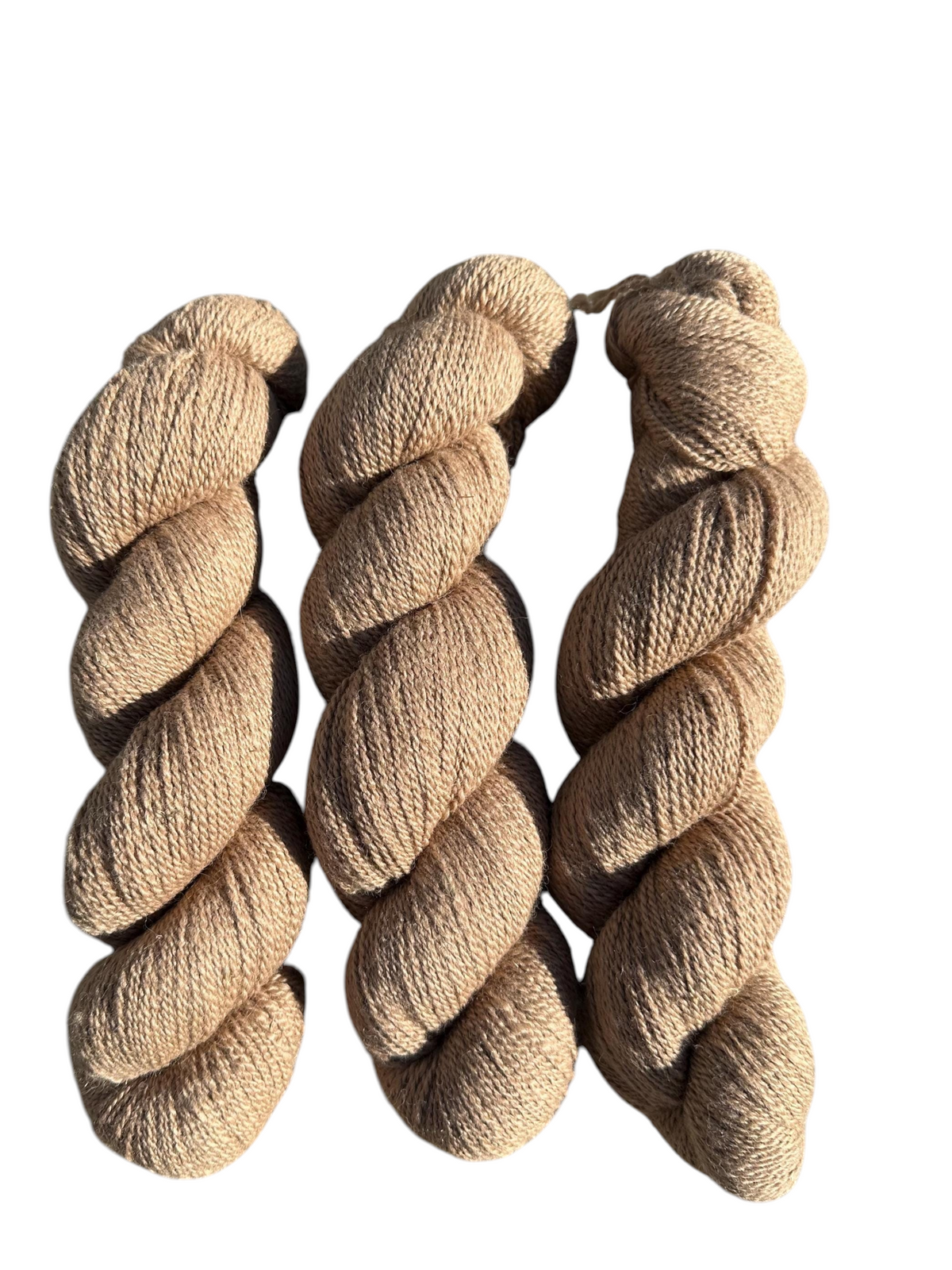 Oak Crest Alpacas and More undyed natural fawn fingering weight alpaca yarn skeins