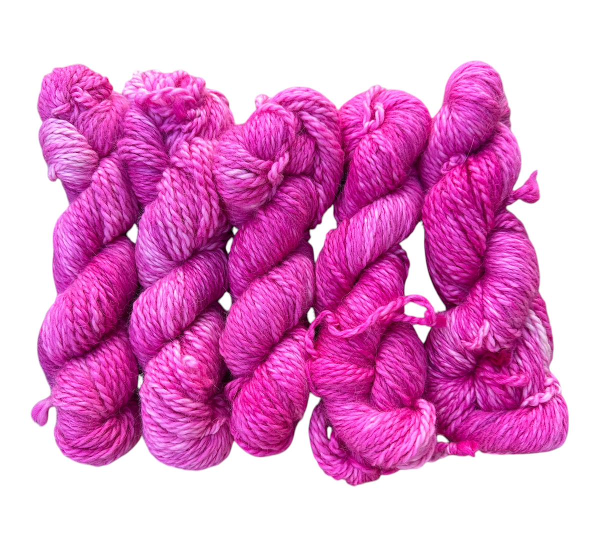 Oak Crest Alpacas and More hand dyed pink orchid alpaca yarn skeins with soft textured fibers