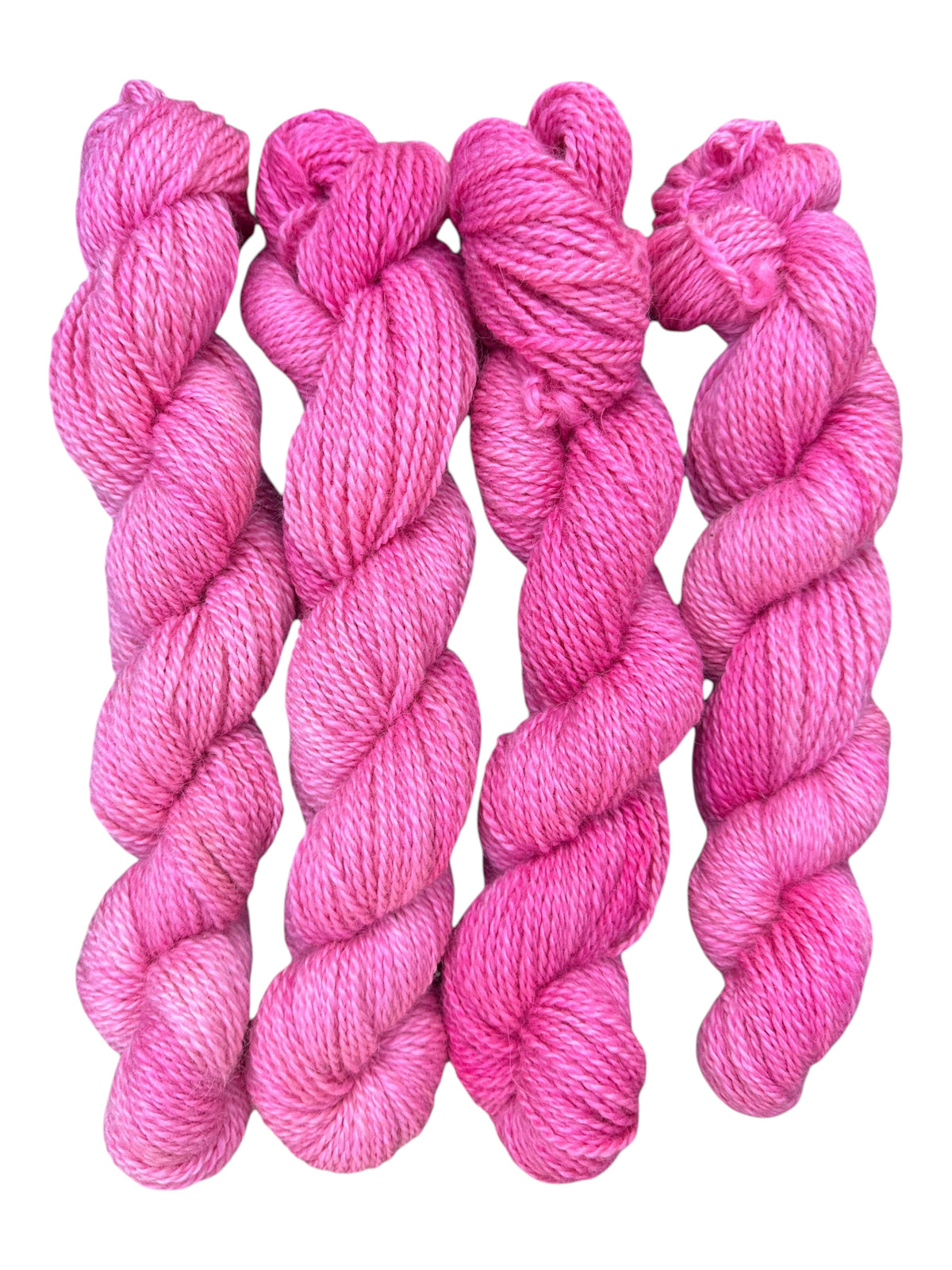 Oak Crest Alpacas and More hand-dyed hot pink 2-ply worsted weight alpaca yarn skeins