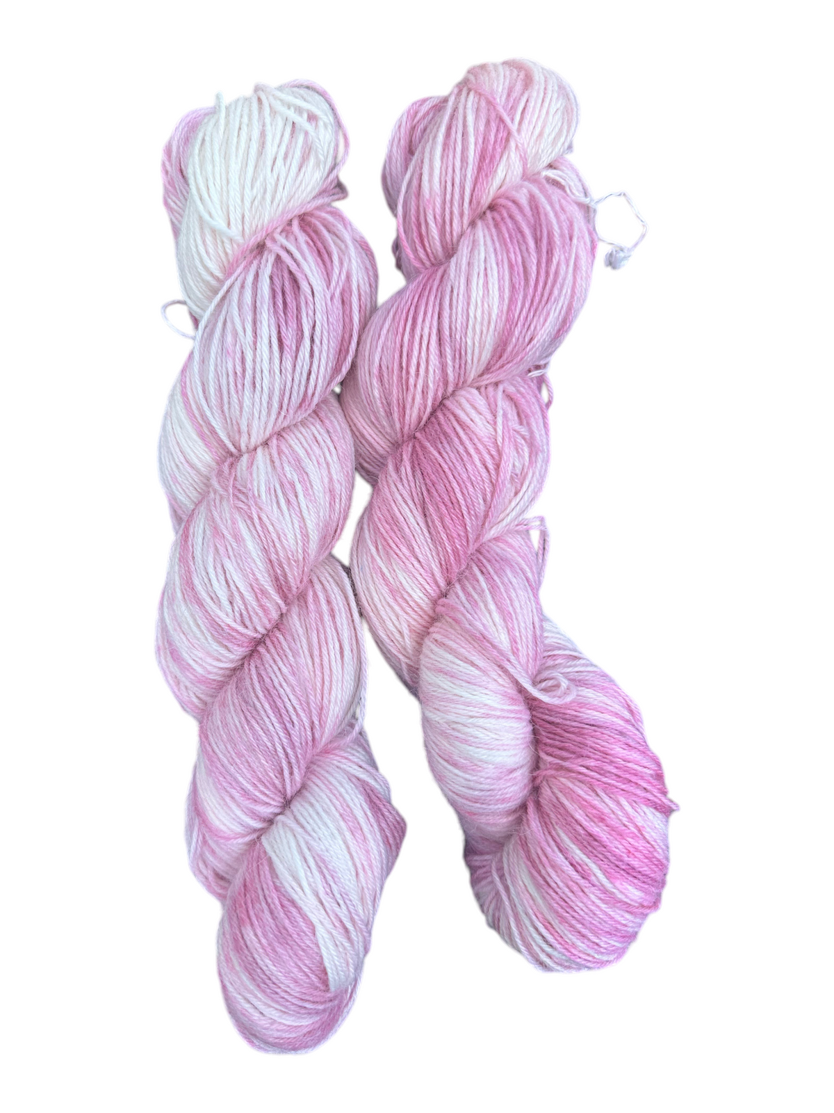 Oak Crest Alpacas and More hand-dyed pink and white variegated alpaca nylon fingering weight sock yarn skeins