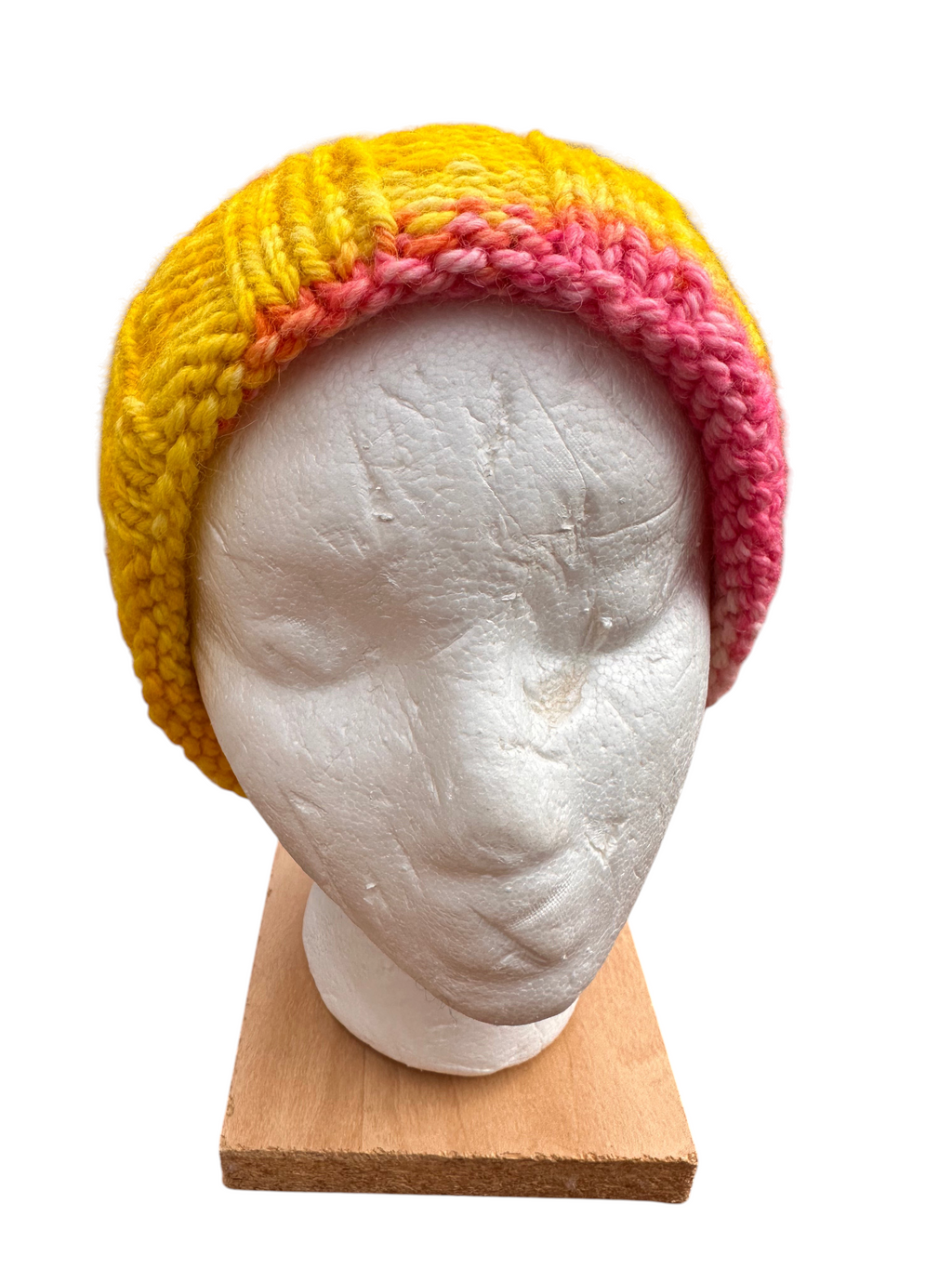 Oak Crest Alpacas and More hand knit pink and yellow alpaca wool beanie on a mannequin head