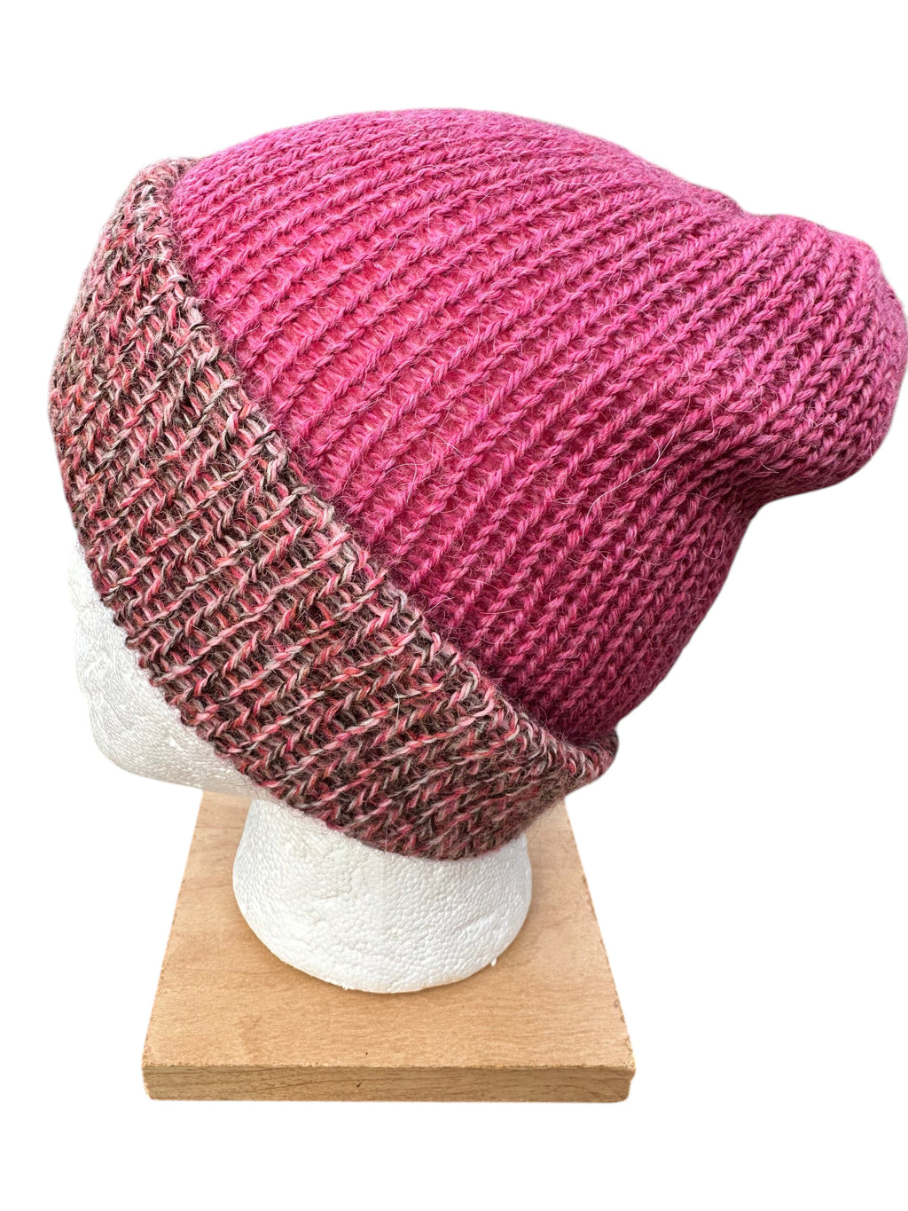 Oak Crest Alpacas and More reversible double knit alpaca hat in pink and brown marled yarn with a fold over brim.