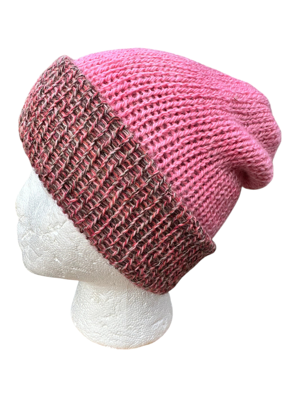 Oak Crest Alpacas and More reversible double knit alpaca hat in pink and brown marled yarn with a fold over brim.