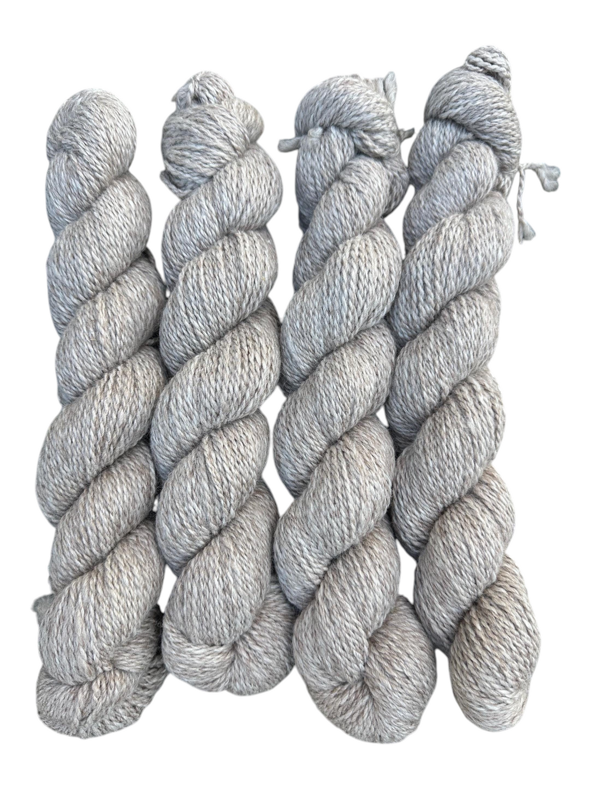 Oak Crest Alpacas and More 100% USA alpaca yarn in a soft rose gray, 2-ply DK weight skeins, dehaired for softness.