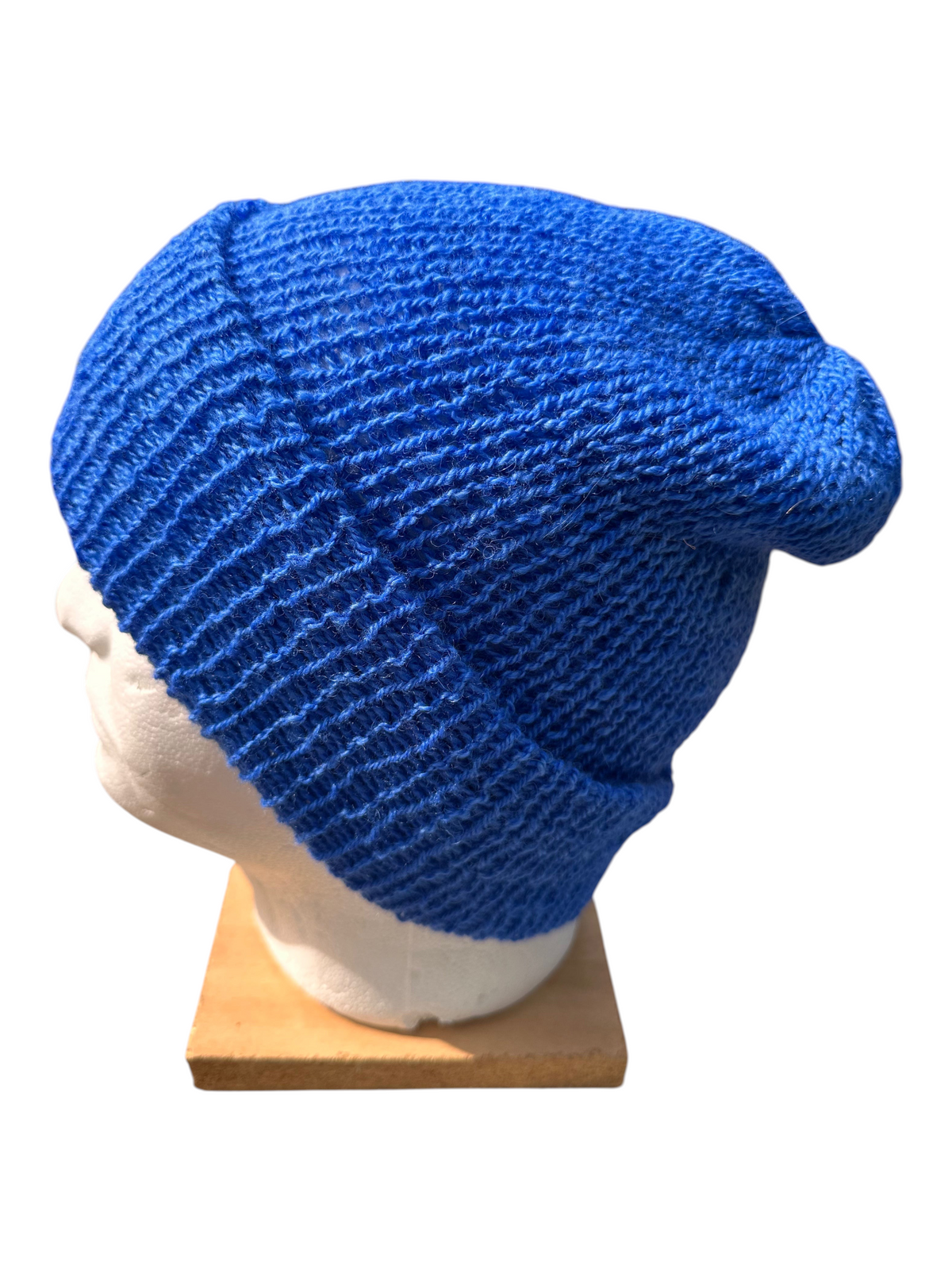 Oak Crest Alpacas and More royal blue lightweight 100% alpaca double knit reversible hat on a mannequin head