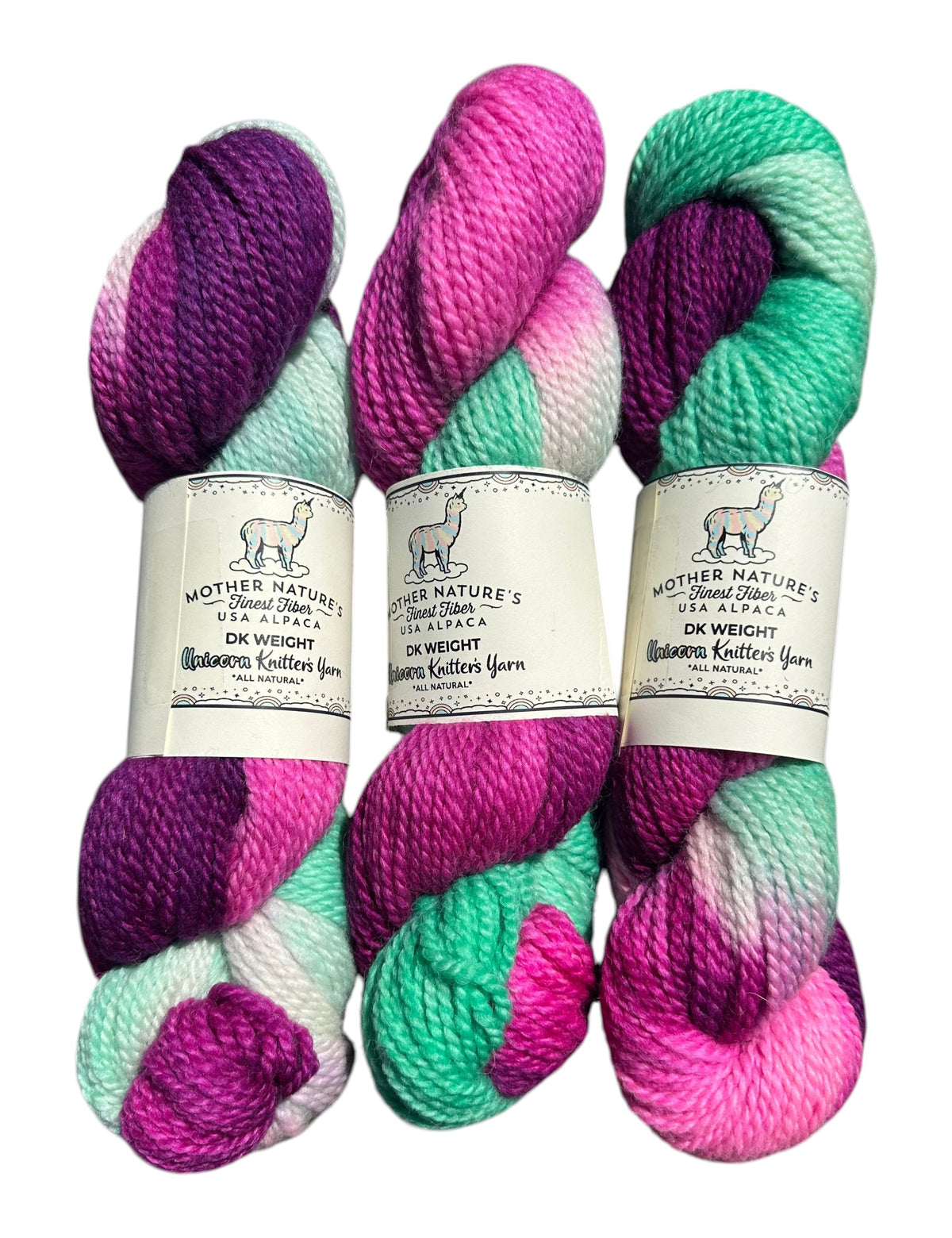 Oak Crest Alpacas and More variegated DK weight yarn in vibrant purple, pink, and mint green alpaca merino blend.