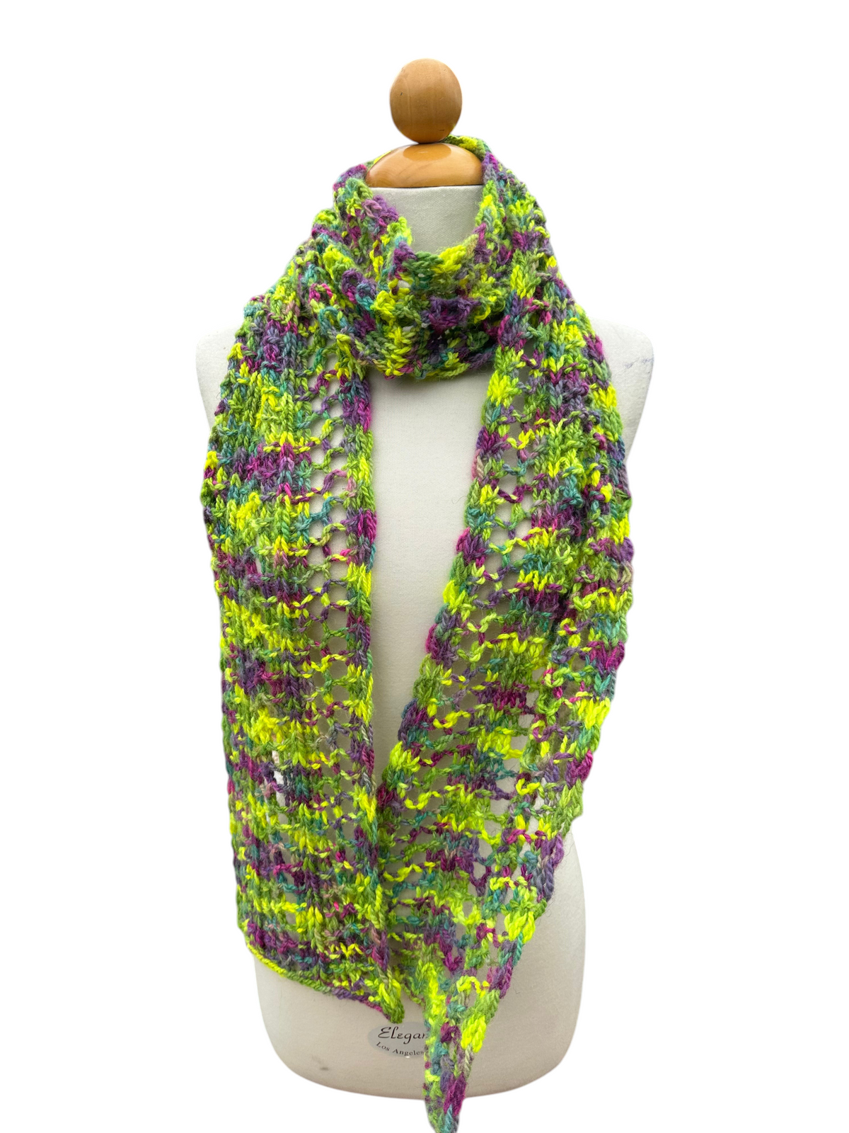 Oak Crest Alpacas and More hand knit alpaca blend scarf in vibrant neon green, purple, and yellow variegated yarn.