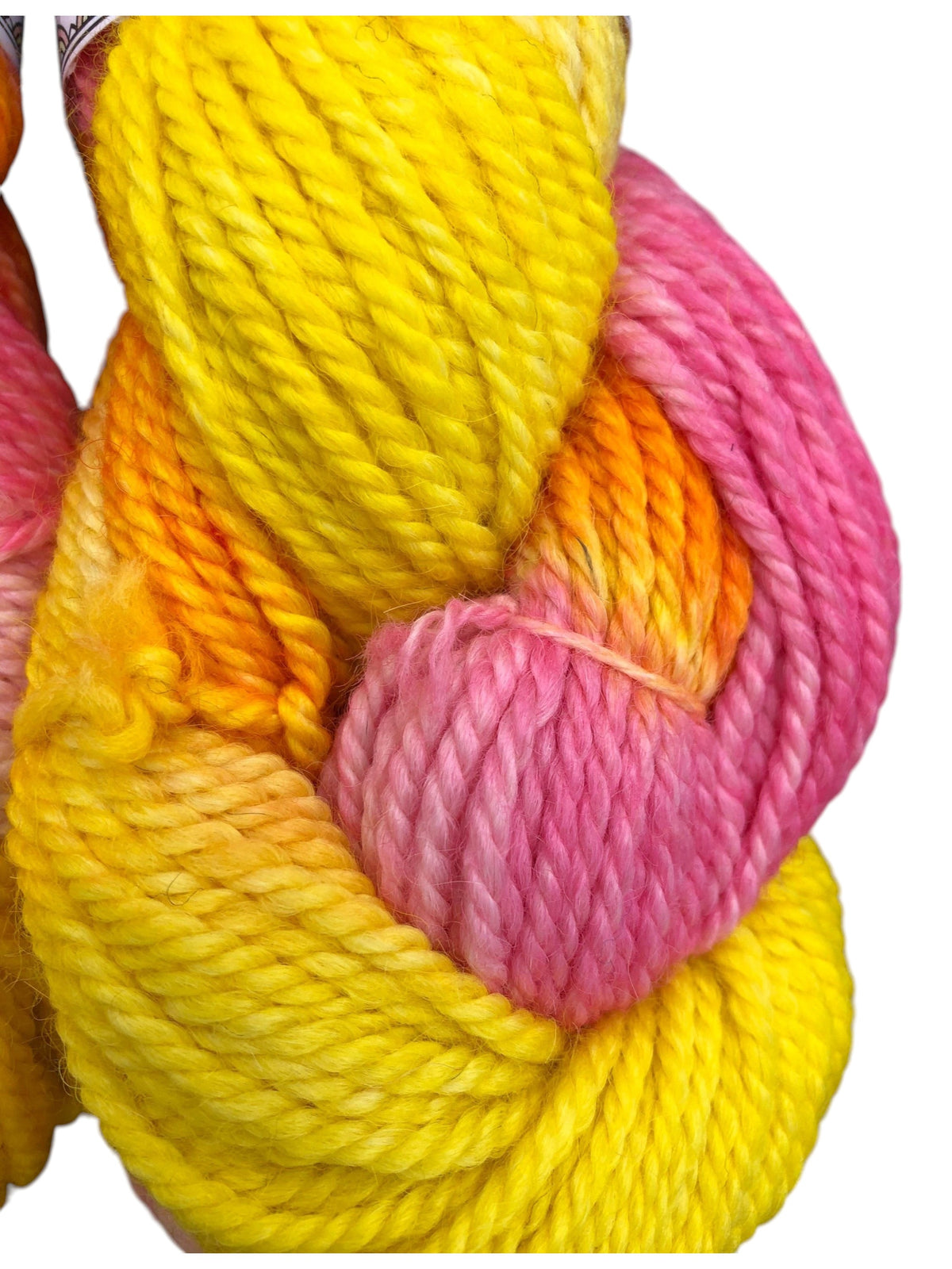 Oak Crest Alpacas and More chunky 3-ply yarn in a vibrant variegated blend of yellow, orange, and pink alpaca wool.