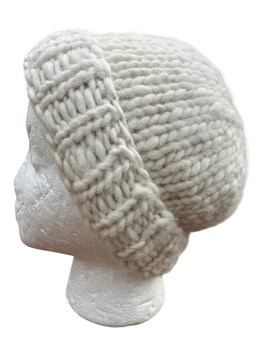 Oak Crest Alpacas and More hand-knit white chunky alpaca wool beanie with a thick fold-over brim on a mannequin head.